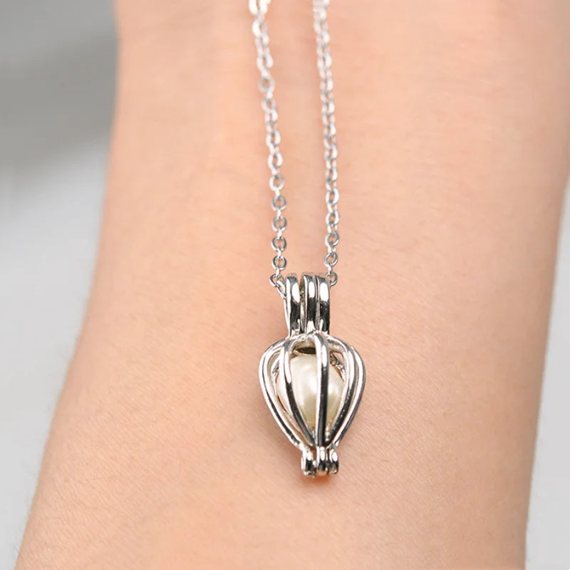 Natural Pearl in Shell with Necklace